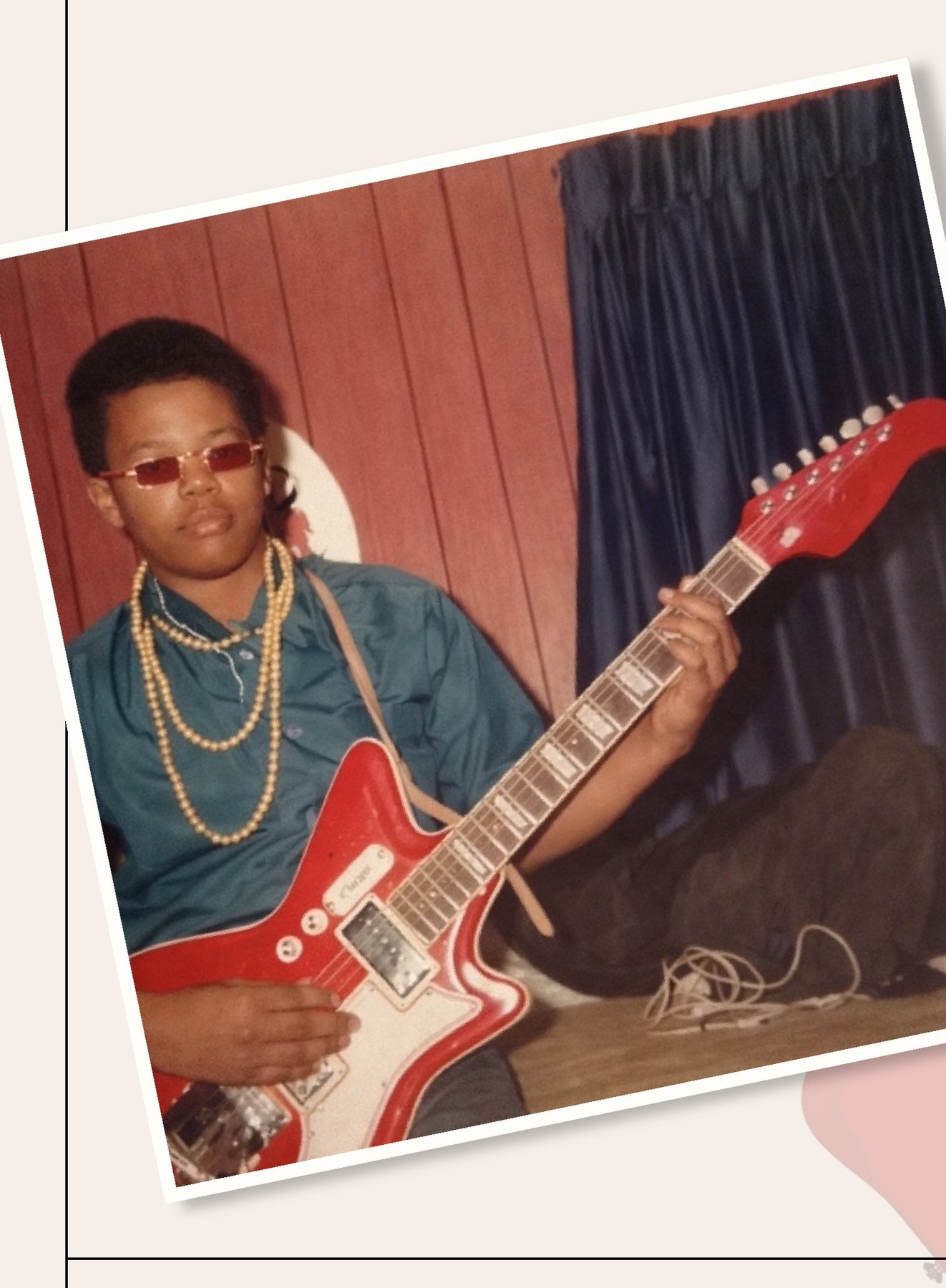 A young Joei Karriem with his first electric guitar, 1970s